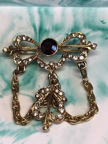 Vintage sphinx gold tone - vintage, bow