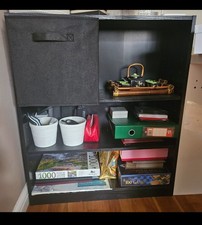 Tall bookcase pine effect with 2 shelves in good working order for storage