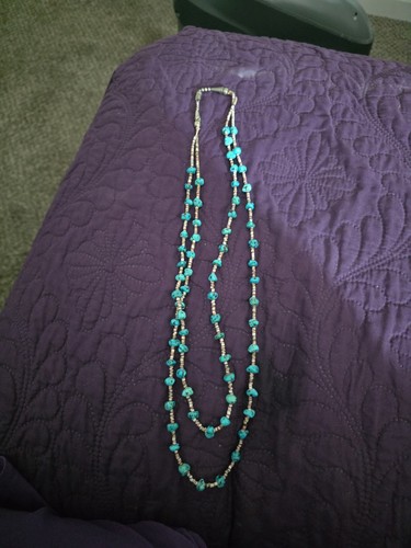 Double stranded turquoise and - stranded,
