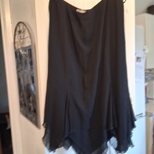 ANN HARVEY Black layered calf length Shirt.SIZE 28 Inverted pleats.