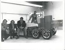 MARCH FORMULA 1 TEAM PERSONNEL WITH SIX WHEELER 1970s B/W PHOTOGRAPH