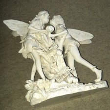 Garden Faries ornament  in a truly delicate loving pose. Lovely !!!