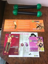 Boxed Zumba Fitness 4 DVD's, 2 X Toning Sticks & Total-Body Transformation Guide