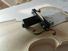 violin bridge clamp hold