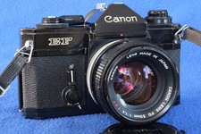 1970s Canon EF 35mm SLR FD 50mm f1.4 SSC in excellent condition, case, handbook
