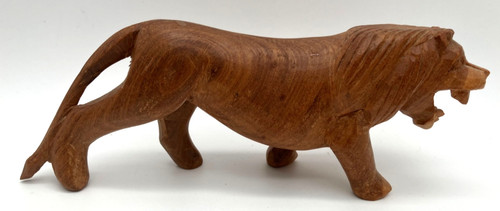 African wooden prowling lion - prowling,