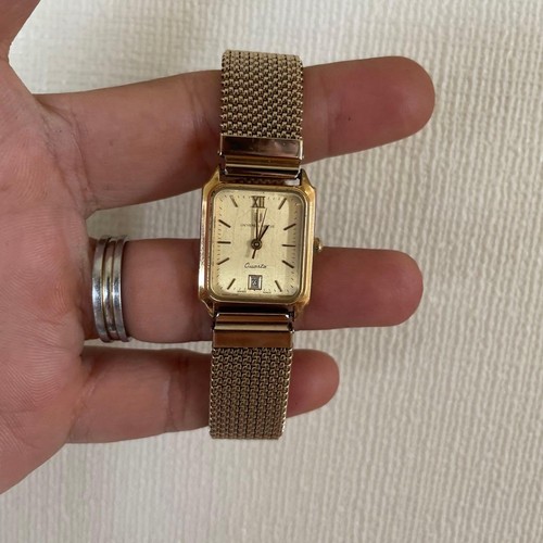 Universal geneve quartz date - geneve,