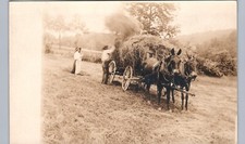 HORSE-DRAWN HAY WAGON c1910