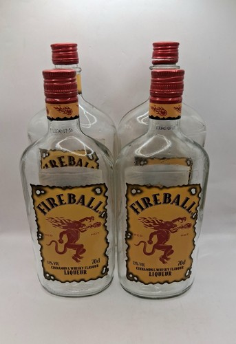 Four empty fireball whiskey - fireball,