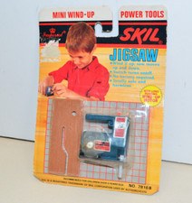 Vintage WIND UP TOY JIGSAW