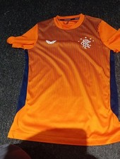 Boys 9-10 Years Old. Castore Glasgow Rangers Orange 2020 Training Football Shirt