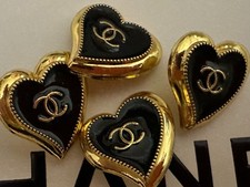 4 VINTAGE CHANEL BUTTONS