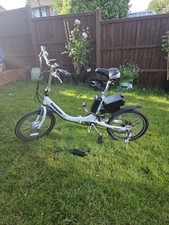 Pedal assisted bike 250w road legal folding  ( brand new battery) 