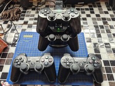 3 x ps3 controllers working, 2 x spares and repairs,docking station 