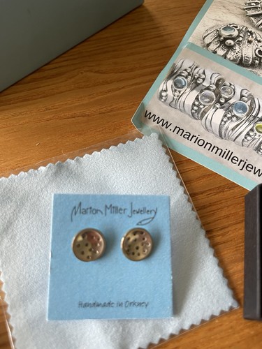 Silver earrings made - made, in