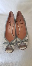 Mary G silver peep toe shoes