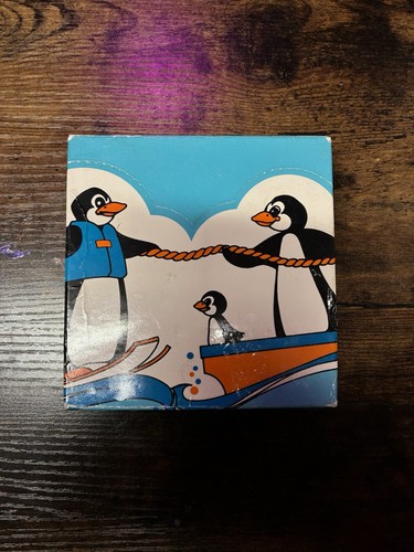 Vintage avon penguin boating - avon,