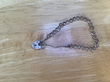 VINTAGE 1970s SILVER CHARM