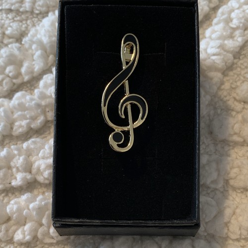 Gold tone treble clef music - gold,