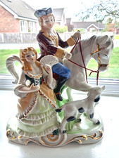 Perfect Dresden lace colonial couple porcelain figurine.