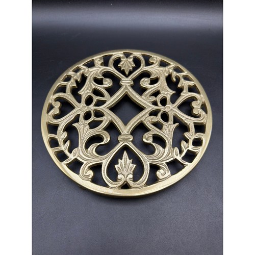 Vintage brass tone trivet - brass,