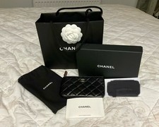 Authentic CHANEL Mini O Case in Black Lambskin Very good condition with extras