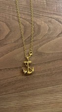Gold tone nautical rope anchor
