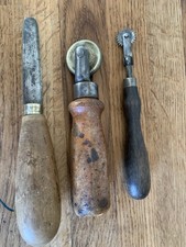 A Trio Of Vintage Leather Work Tools