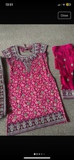 Beautiful cerise 3 piece Indian suit. Will fit size 10/12.
