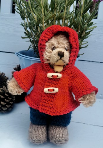 Hand knitted teddy bear