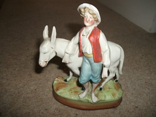 Antique man with - donkey, spill