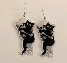 Black Cat And Skeleton