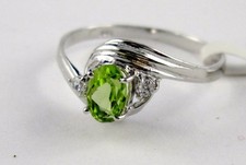 L10 Peridot Ring Oval Cut 925 Silver with 2 Zirconia silver Wawes Design