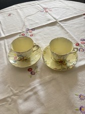 Staffordshire Bone China Tea Cups and Saucers Floral Patterns Hand Decorated x2