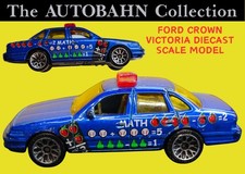 1998 FORD CROWN VICTORIA POLICE CAR IN MATH LIVERY; 1:64 SCALE DIECAST MODEL CAR