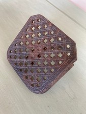 Vintage cast iron trivet with slider from old kitchen range