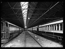 Railway carriages sit a - carriages,