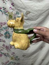 QUAINT TERRIER DOG JUG WITH GREEN HANDLE 