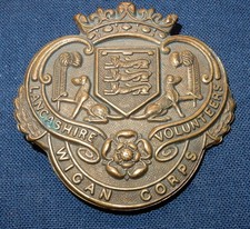 THE LANCASHIRE VOLUNTEERS WIGAN CORPS BRITISH MILITARY CAP BADGE BRASS - SLIDER