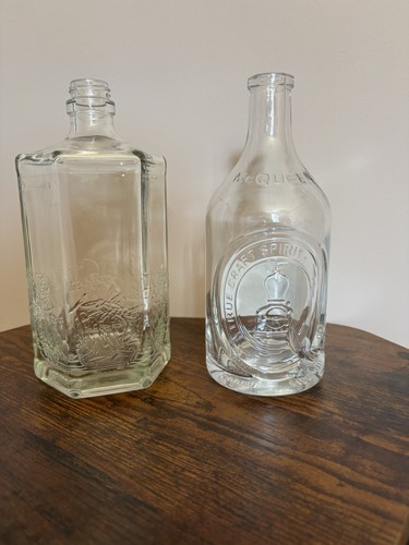 Empty clear gin bottles - gin,