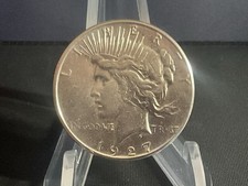 1927s. 1oz Silver American Peace Dollar.  In Capsule.