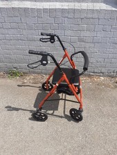 A WALKER FOR DISABLED PEOPLE TWO BRAKES AND COMPARTMENT UNDER SEAT 