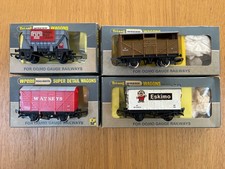 OO gauge  Wrenn boxed 4 assorted wagons in good condition in fair boxes