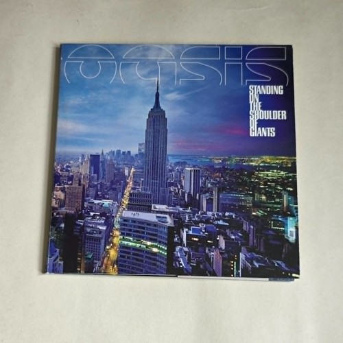 Oasis standing on the - -,