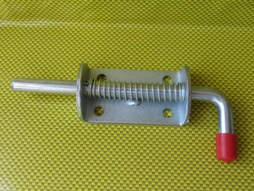 Spring loaded bolt gate door