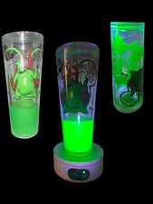 A Neon Lava Drip Tumbler 24 oz with Lid and Straw