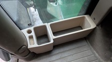 Tractor cab floor organiser