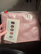 Glossier Zip Bubble Pouch Bag