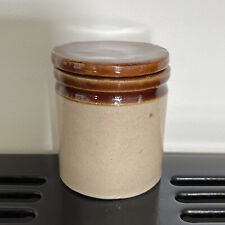 Vintage/antique glazed two-tone earthenware pot and lid.