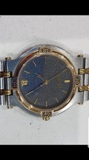 Gucci 9000M  mens watch. Black dial, silver gold date. In orginal box.
